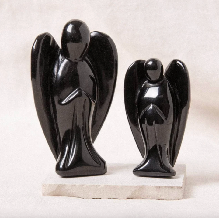 Statuetta di angelo custode in pietra naturale